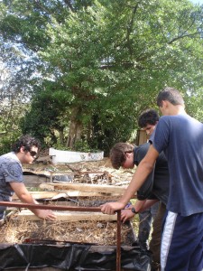 Zach and Matthew making raised plant beds with 2 students from the Green Valley School.